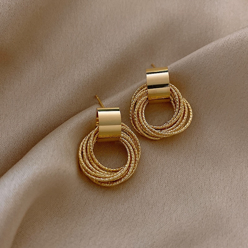 Brinco Laço Dourado